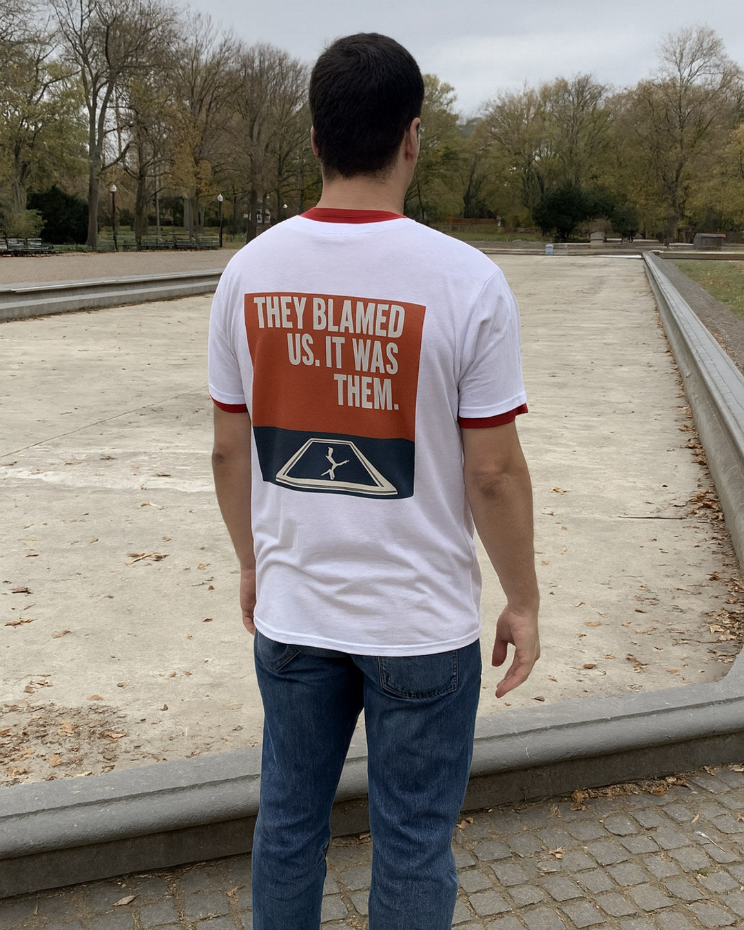 "They Blamed Us. It Was Them." Tee — worn in the wild