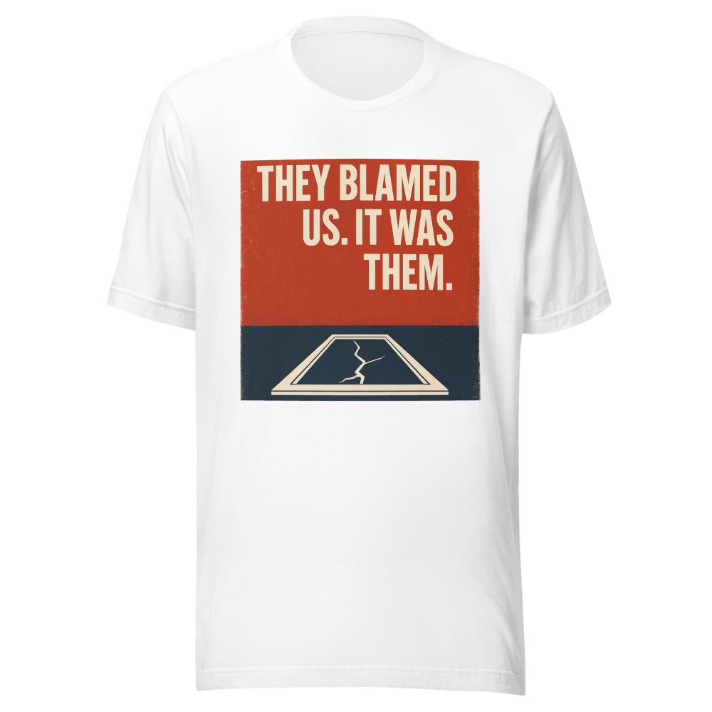 "They Blamed Us. It Was Them." Tee — political satire tee mockup — view 1