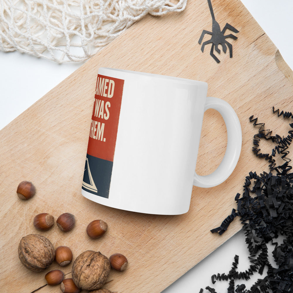 "They Blamed Us. It Was Them." Mug — political satire mug mockup — view 7